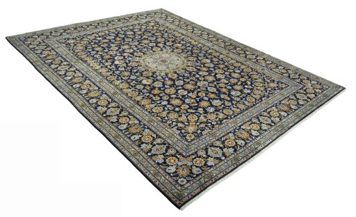 Close-up detail of 2000s Kashan rug from Iran / Persia showing Wool weave