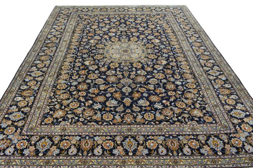 Surface texture of 2000s Kashan rug with natural Wool and intricate pattern