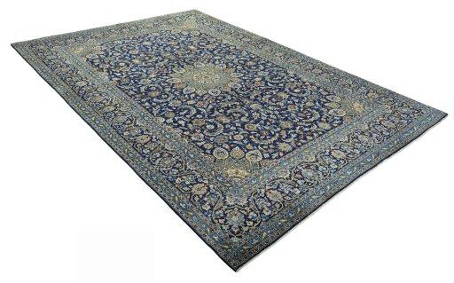 Close-up detail of 2000s Kashan rug from Iran / Persia showing Wool weave