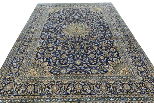 Surface texture of 2000s Kashan rug with natural Wool and intricate pattern