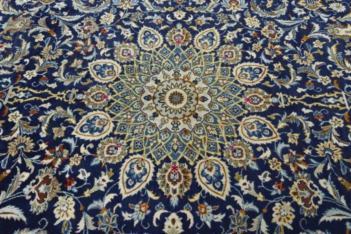 Central medallion detail of 2000s Kashan rug from Iran / Persia