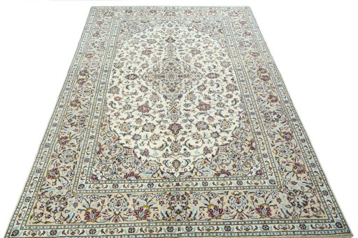 Surface texture of 2000s Kashan rug with natural Wool and intricate pattern