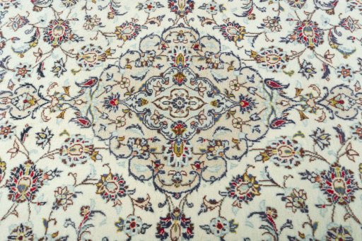 Central medallion detail of 2000s Kashan rug from Iran / Persia