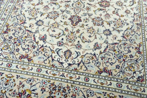 Close-up detail of 2000s Kashan rug from Iran / Persia showing Wool weave