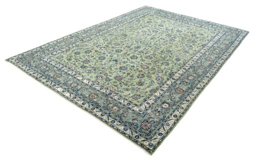 Corner detail of 2000s Kashan rug showing border pattern and Wool pile