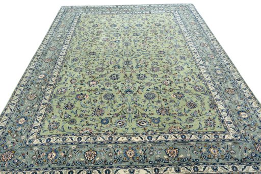 Surface texture of 2000s Kashan rug with natural Wool and intricate pattern