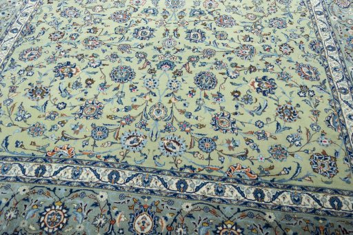 Close-up detail of 2000s Kashan rug from Iran / Persia showing Wool weave