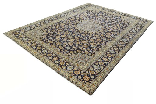 Corner detail of 2000s Kashan rug showing border pattern and Wool pile