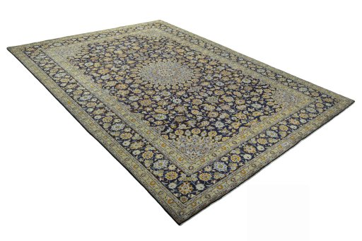 Close-up detail of 2000s Kashan rug from Iran / Persia showing Wool weave