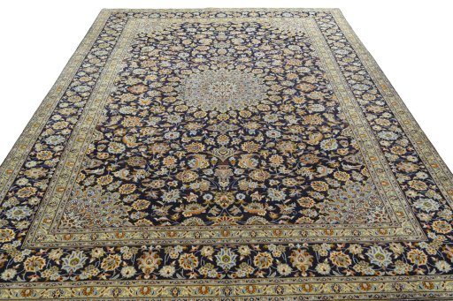 Surface texture of 2000s Kashan rug with natural Wool and intricate pattern