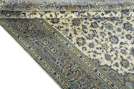 Close-up detail of 2000s Kashan rug from Iran / Persia showing Wool weave