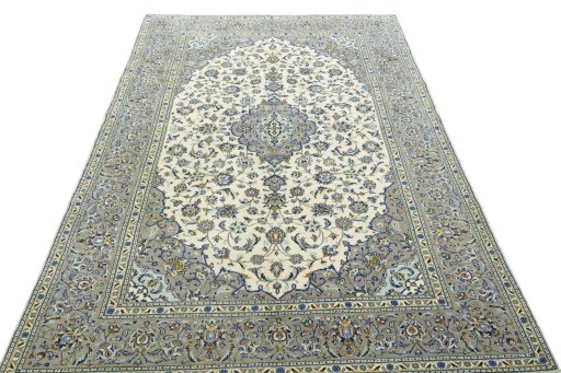 Surface texture of 2000s Kashan rug with natural Wool and intricate pattern