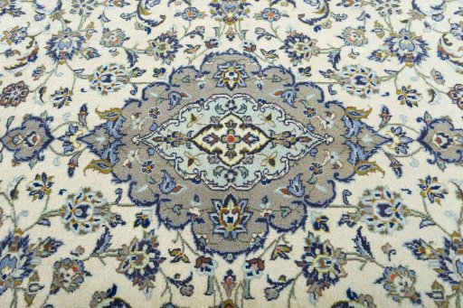 Central medallion detail of 2000s Kashan rug from Iran / Persia