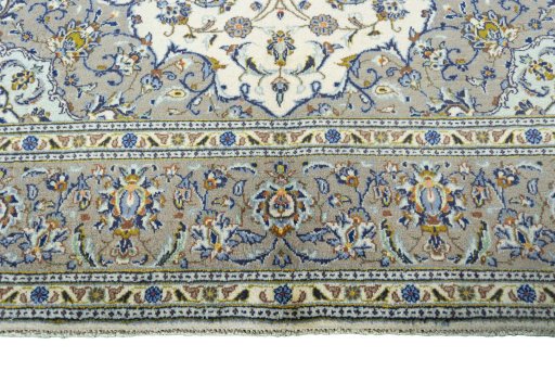 Full view of 2000s Kashan rug from Iran / Persia, 313 × 205 cm in Beige tones