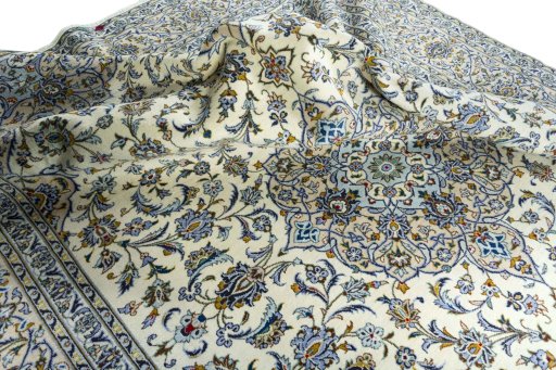 Surface texture of 2000s Kashan rug with natural Wool and intricate pattern