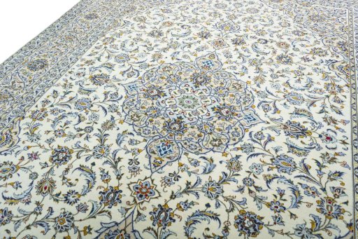 Backside of handmade 2000s Kashan rug showing knot structure and weave density