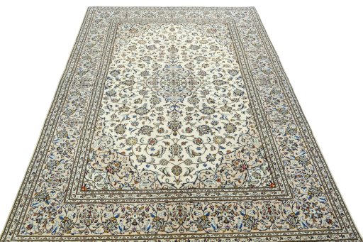 Surface texture of 2000s Kashan rug with natural Wool and intricate pattern