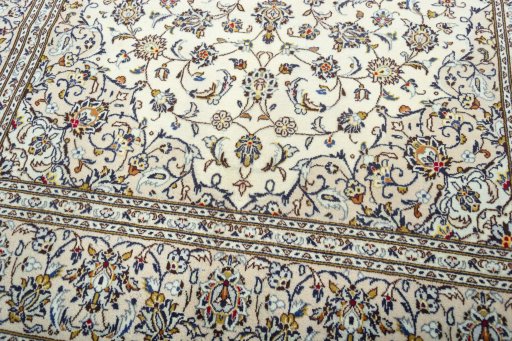 Close-up detail of 2000s Kashan rug from Iran / Persia showing Wool weave