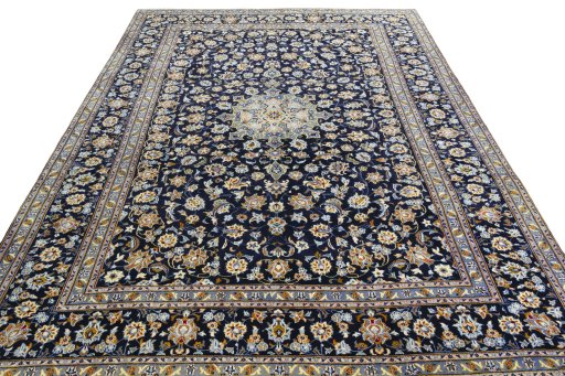 Surface texture of 2000s Kashan rug with natural Wool and intricate pattern