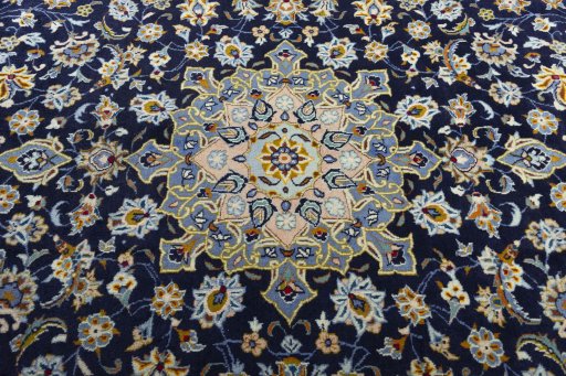 Central medallion detail of 2000s Kashan rug from Iran / Persia