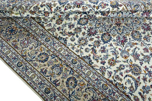 Close-up detail of 2000s Kashan rug from Iran / Persia showing Wool weave