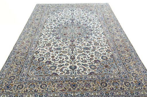 Surface texture of 2000s Kashan rug with natural Wool and intricate pattern