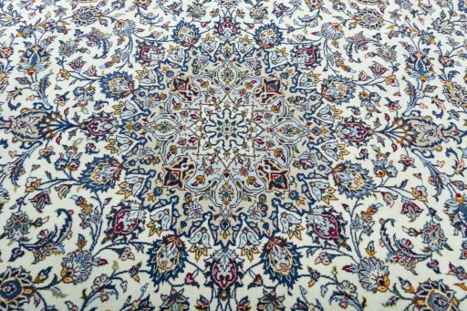 Central medallion detail of 2000s Kashan rug from Iran / Persia