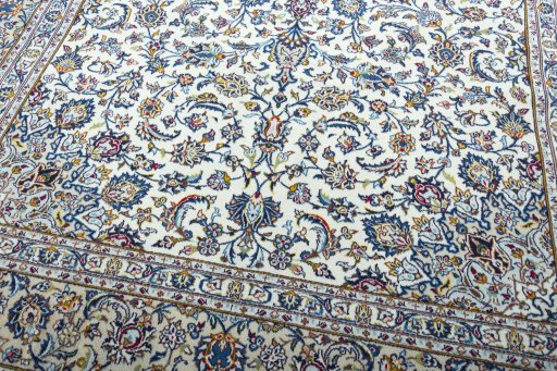 Close-up detail of 2000s Kashan rug from Iran / Persia showing Wool weave