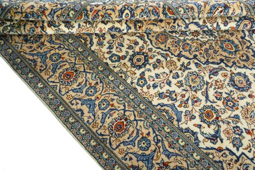 Close-up detail of 2000s Kashan rug from Iran / Persia showing Wool weave
