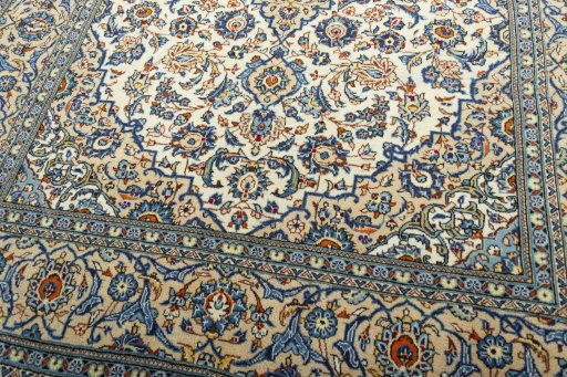 Close-up detail of 2000s Kashan rug from Iran / Persia showing Wool weave