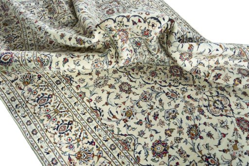 Surface texture of 2000s Kashan rug with natural Wool and intricate pattern