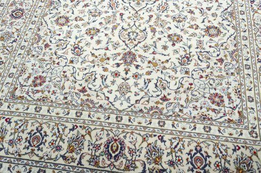 Close-up detail of 2000s Kashan rug from Iran / Persia showing Wool weave