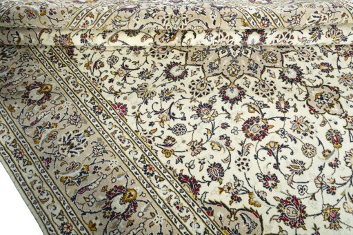 Close-up detail of 2000s Kashan rug from Iran / Persia showing Wool weave