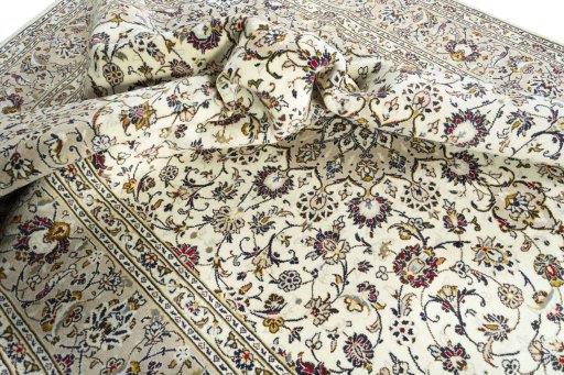 Surface texture of 2000s Kashan rug with natural Wool and intricate pattern