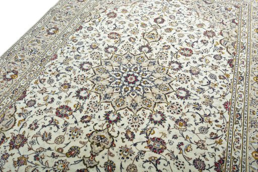 Backside of handmade 2000s Kashan rug showing knot structure and weave density
