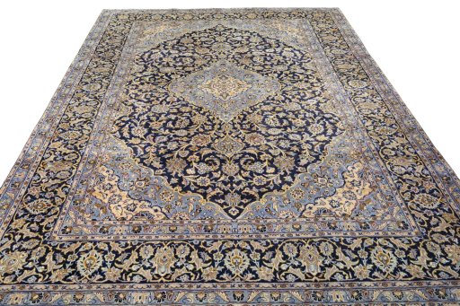 Surface texture of 2000s Kashan rug with natural Wool and intricate pattern