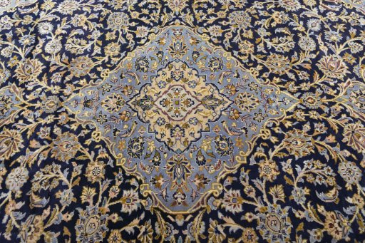 Central medallion detail of 2000s Kashan rug from Iran / Persia