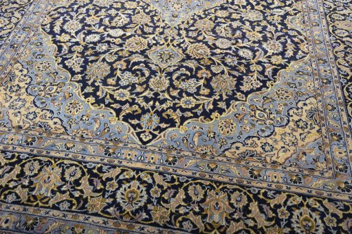 Close-up detail of 2000s Kashan rug from Iran / Persia showing Wool weave