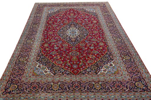 Surface texture of 2000s Kashan rug with natural Wool and intricate pattern