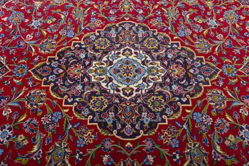 Central medallion detail of 2000s Kashan rug from Iran / Persia