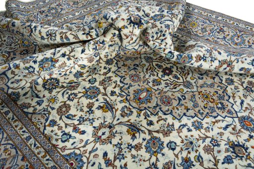 Surface texture of 1970s Kashan rug with natural Wool and intricate pattern