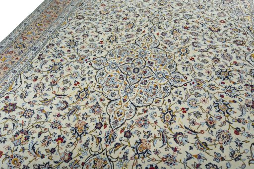 Backside of handmade 2000s Kashan rug showing knot structure and weave density