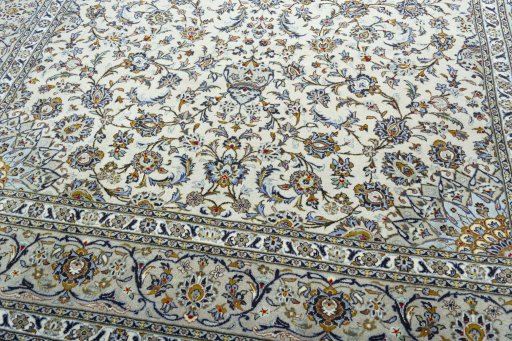 Close-up detail of 2000s Kashan rug from Iran / Persia showing Wool weave