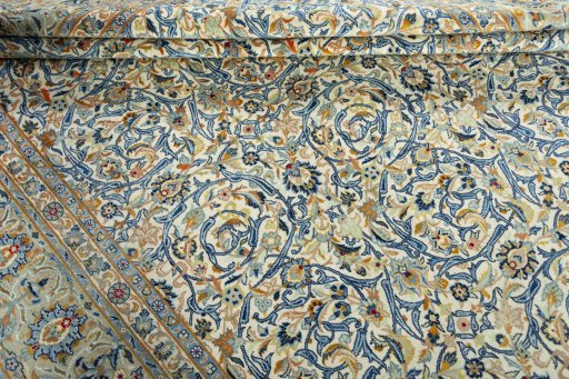 Close-up detail of 2000s Kashan rug from Iran / Persia showing Wool weave