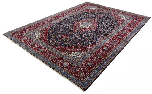 Corner detail of 2000s Kashan rug showing border pattern and Wool pile