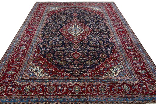 Surface texture of 2000s Kashan rug with natural Wool and intricate pattern