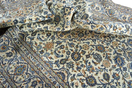 Surface texture of 2000s Kashan rug with natural Wool and intricate pattern