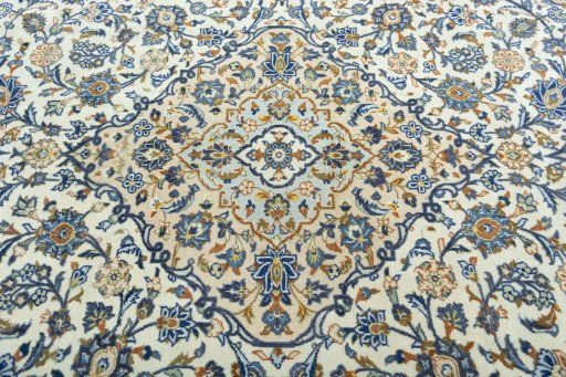 Central medallion detail of 2000s Kashan rug from Iran / Persia