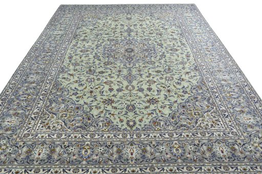 Surface texture of 2000s Kashan rug with natural Wool and intricate pattern