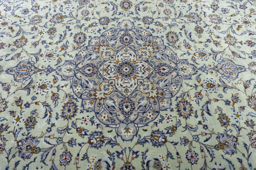 Central medallion detail of 2000s Kashan rug from Iran / Persia